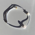 Bracelet Taureau, cordon gris, nacre et médaillon or
